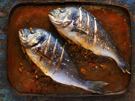 Baked fish with a coriander and nut stuffing