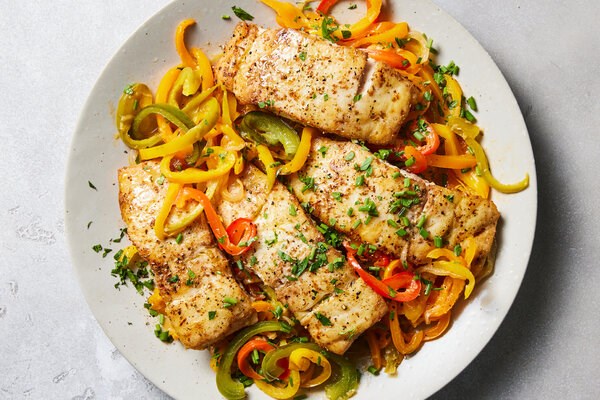 Baked fish with slow-cooked peppers