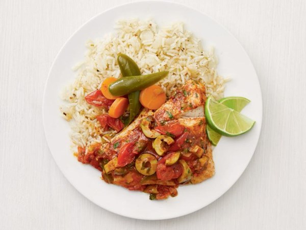 Baked fish with tomato-olive sauce 
