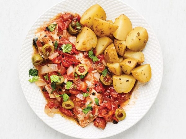 Baked fish with tomatoes, olives and capers