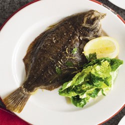 Baked flounder with lemon, parsley and cos salad