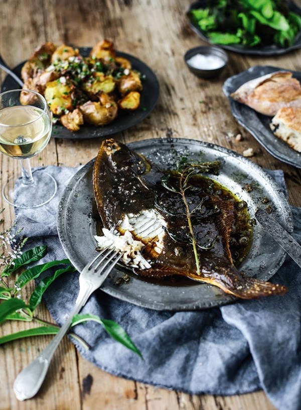 Baked flounder with lemon verbena butter & smashed herby potatoes [Fiona Hugues]