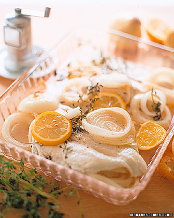 Baked flounder with lemons and onions