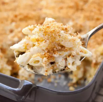 Baked four-cheese pasta with tomatoes and basil