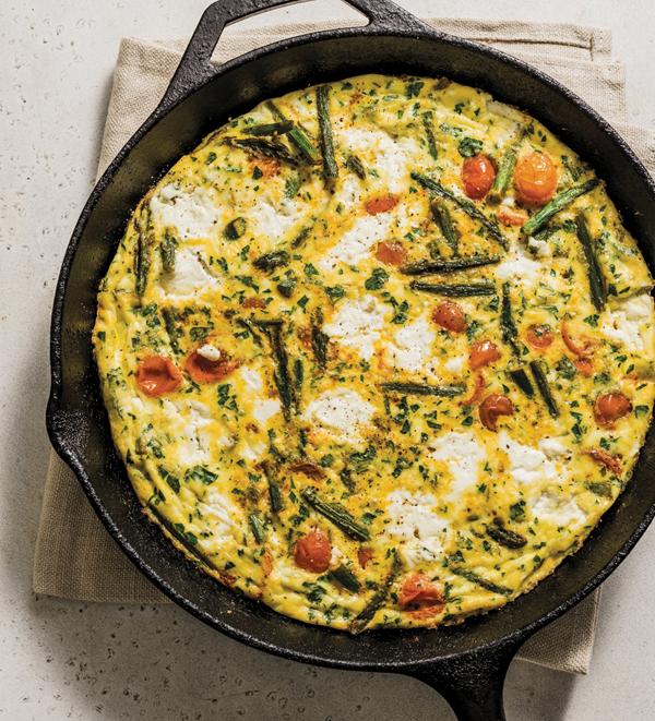 Baked frittata with ricotta, asparagus and cherry tomatoes
