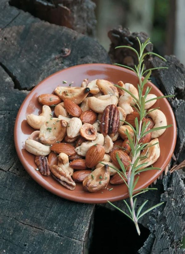 Baked garlic nuts with whole garlic cloves and rosemary