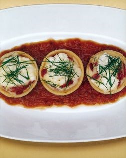 Baked goat's cheese and pimiento tarts with spiced tomato chilli pickle