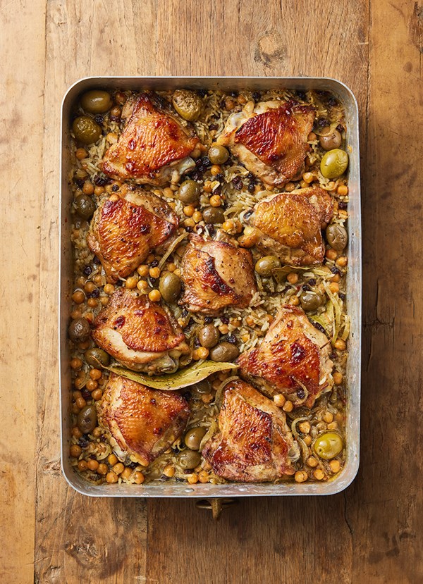 Baked Greek chicken on herby lemon rice and chickpeas