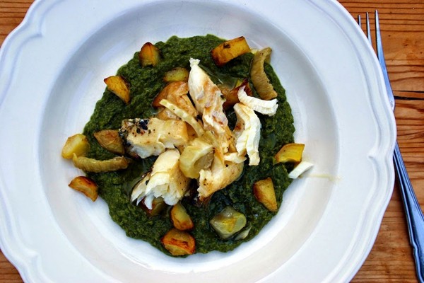 Baked haddock with wild garlic and pea puree