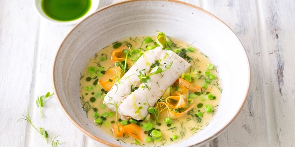 Baked hake with summer vegetables and dill oil