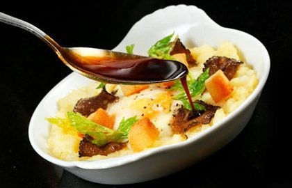 Baked hen's egg with crushed celeriac, truffle and croutons