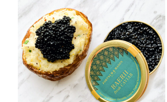 Baked jacket potatoes with lemon crème fraîche and caviar