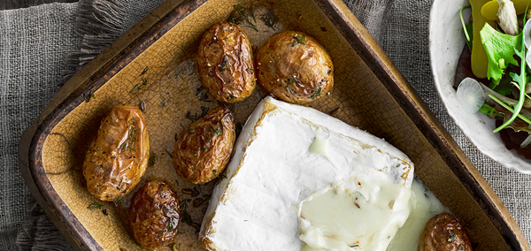 Baked Jersey Royals with Brie and pickles