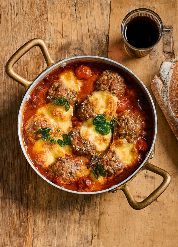 Baked lamb and bacon meatballs with mānuka smoke infused balsamic drizzle tomato sugo