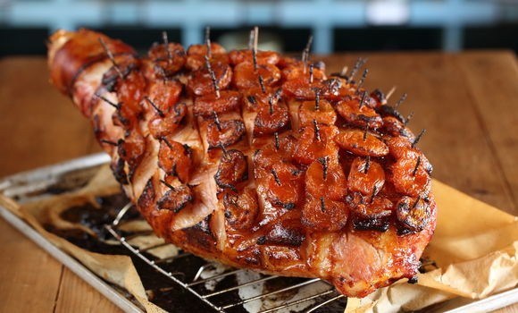 Baked leg ham with mustard apricots