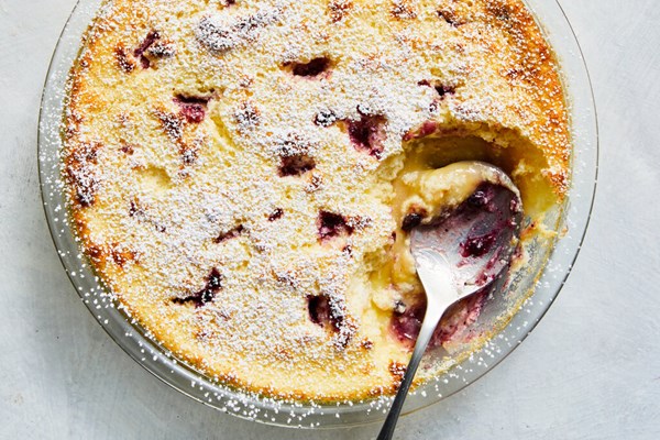 Baked lemon pudding with blueberry jam