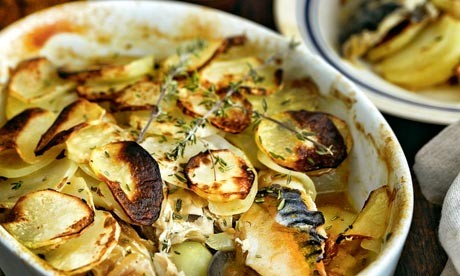Baked mackerel with potatoes, thyme and onions