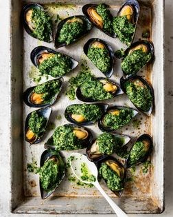 Baked mussels with herb, ginger, and peanut pesto