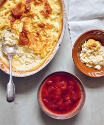 Baked orange rice pudding with strawberry compote