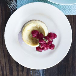 Baked orange ricotta cheesecake with raspberries