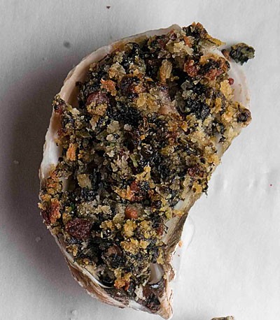 Baked oysters with bacon and spinach