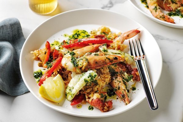 Baked 'paella' with prawns, chorizo and salsa verde