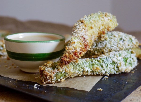 Baked panko-crumbed avocado fries with tahini miso sauce