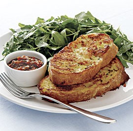 Baked Parmesan French toast with tapenade and arugula salad