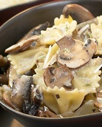 Baked pasta with roasted wild mushrooms in a creamy thyme sauce