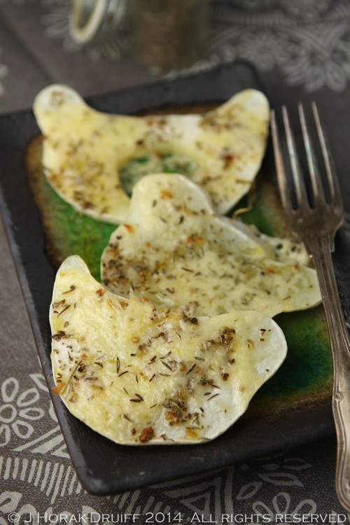 Baked pattypan squash steaks with cheese and herbs