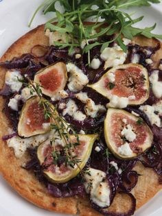 Baked pitakia with feta, fig and rocket