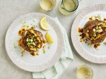 Baked potato with onion and harissa butter