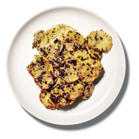 Baked potatoes with anchovy and pesto