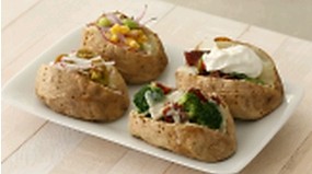 Baked potatoes with assorted toppings