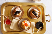 Baked potatoes with crème fraîche and caviar