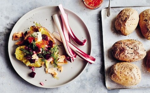 Baked potatoes with smoked trout, dilled beetroot and keta