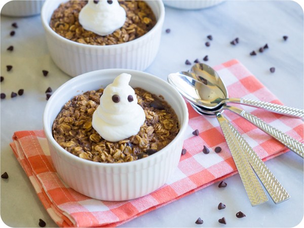 Baked pumpkin chocolate chip oatmeal with Greek yogurt ghosts
