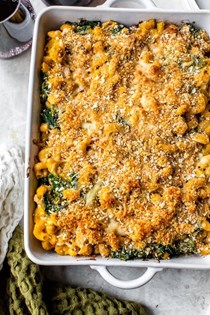 Baked pumpkin pasta with pancetta, Gruyere, kale, and white beans