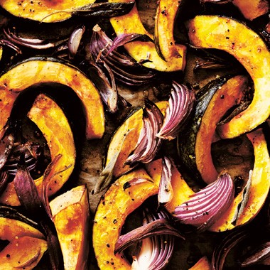 Baked pumpkin with lemon, sautéed greens and toasted cumin dressing