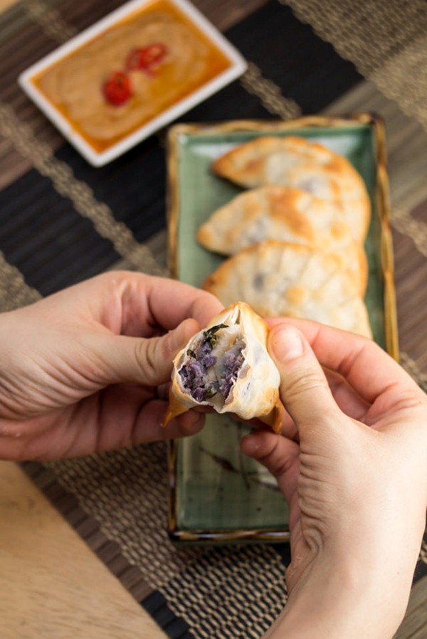 Baked purple yam and sweet potato dumplings with peanut sauce