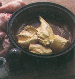 Baked rabbit in saffron cream