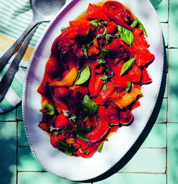 Baked red vegetables with lemon, anchovy & basil