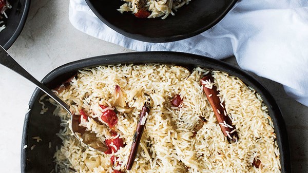 Baked rice with confit tomatoes and garlic