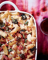 Baked rigatoni with broccoli, green olives and pancetta