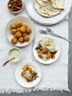 Baked root vegetable falafel with green yogurt