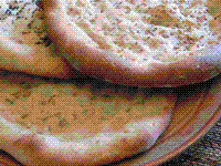 Baked round Uyghur bread (Nángbĭng / 饢餅)
