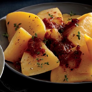 Baked rutabaga with "red-eye" tomato sauce