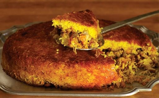 Baked saffron yogurt rice with lamb (Tah-chin-e barreh)