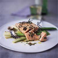 Baked salmon with a parsley-anchovy vinaigrette and grilled leeks