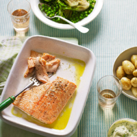Baked salmon with braised veg and watercress crème fraîche